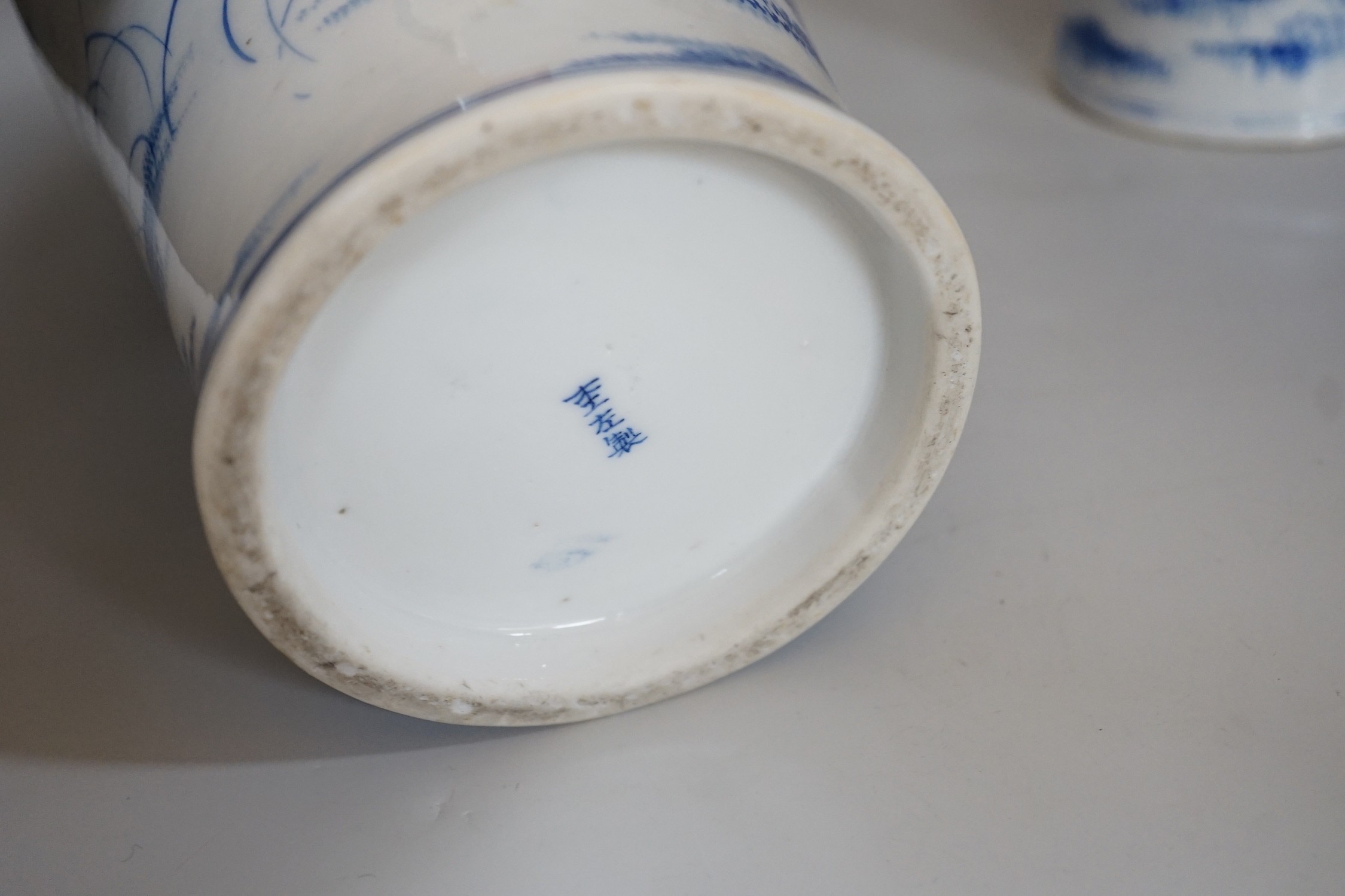 A pair of Japanese blue and white vases, 37cm high